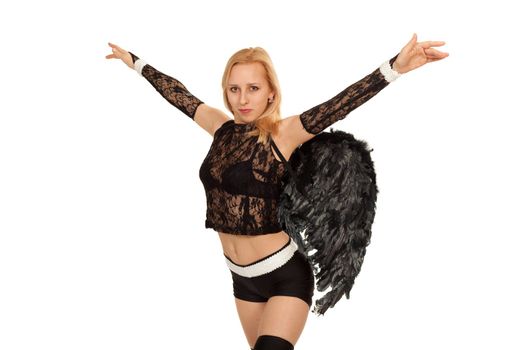 Model in costume of black angel posing for photo