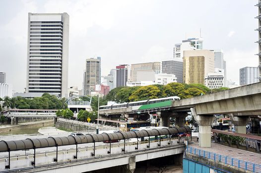 Cityscape with railway and high office buildings in Kuala Lumpur, Malaysia