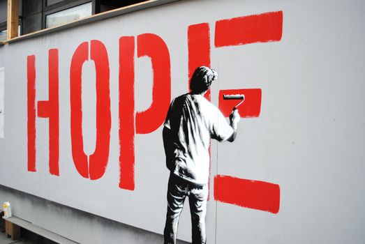 Stencil graffiti depicting the word "hope".