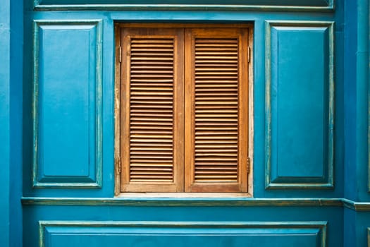 green wooden and window