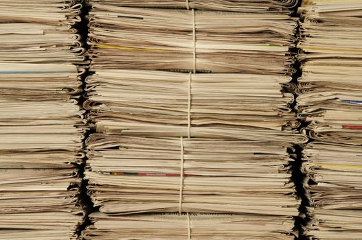 Close-up of piles of newspapers to be recycled