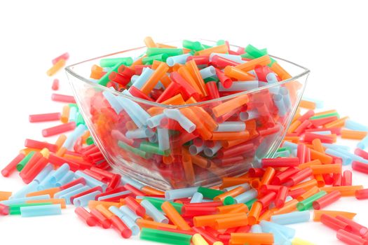 Colorful straws in a bowl