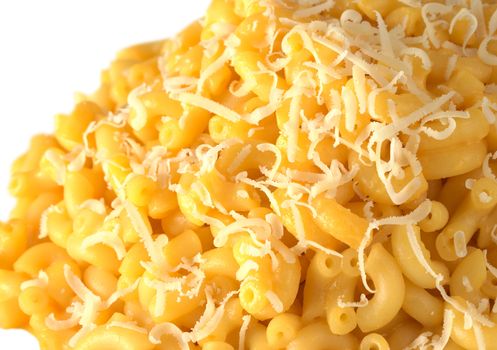 Macaroni and cheese with grated cheese on top (Selective Focus, Focus on the front on the right) 