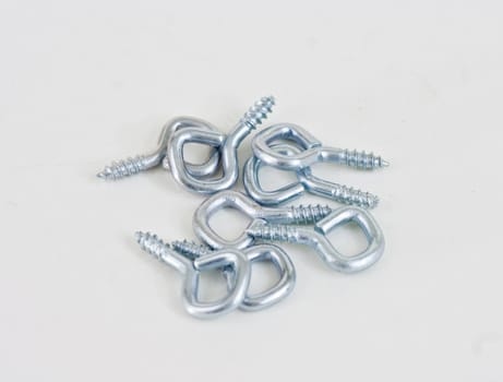 Several screw eyelets on a white background.