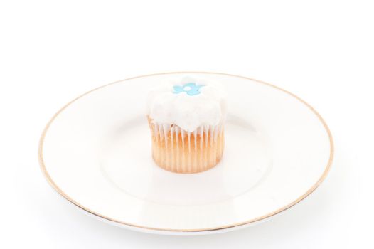 little iced cupcake isolated on white background