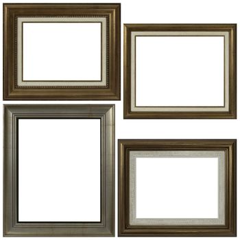 Four antique picture frames isolated on white background.