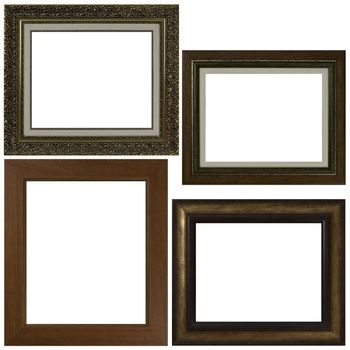 Four antique picture frames isolated on white background.