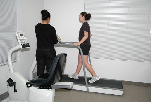 A teenage girl having physical therapy                      