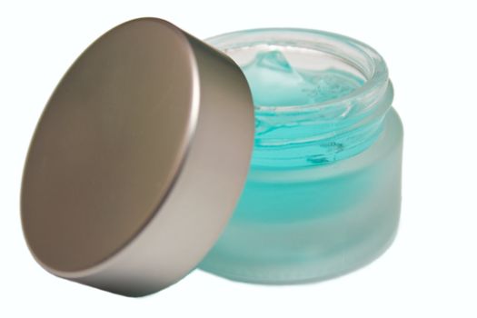 Blue gel for care of the face in a glass jar
