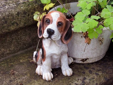 a cute little beagle garden figurine