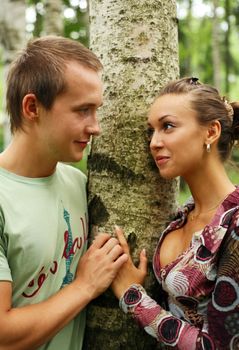 Young girl and the man in a forest