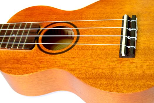 Part of ukulele isolated on white background