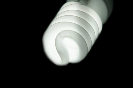 White light bulb, lit, isolated towards white