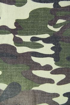 fragment of the canvas from military trousers abstract background