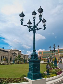 Oldstyle lamppost around garden in Grand Palace, Bangkok, Thailand