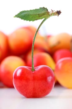 Fresh ripe cherries isolated on white background