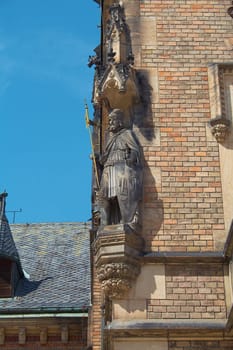 historic building, stucco on the walls, a statue