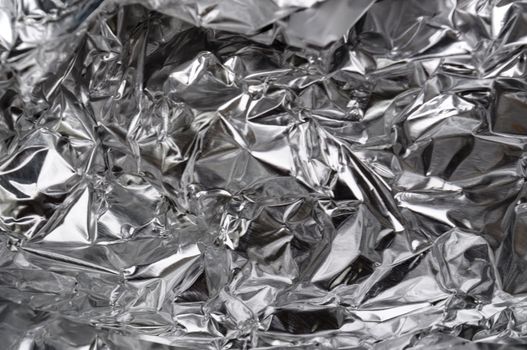 Food foil, crumpled like silver background
