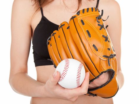 young girl , wearing a baseball mitt and catching a soft ball.