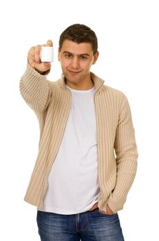 young man holding a bottle of medicine