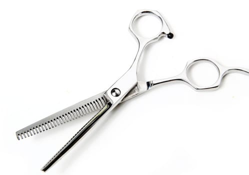 Professional Haircutting Scissors. Studio isolation on white. 
