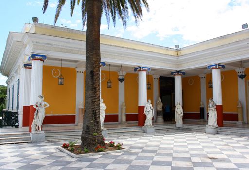 Terrace of famous Achillieon palace with Corinth style columns and sculptures, Corfu, Greece