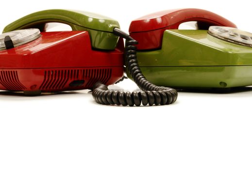 colourful retro phones symbolizing conference/teamwork/network............