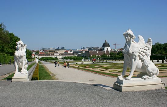 Garden behind Belvedere castle with lot of flowers and sculptures like sphinx