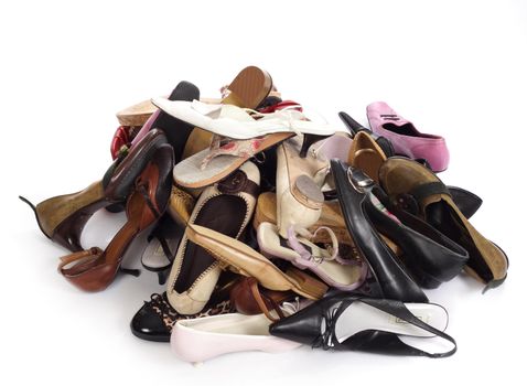 heap of the ladies' shoes, photo on white