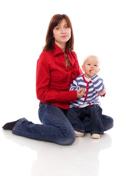 Mother playing with baby girl sitting isolated on white