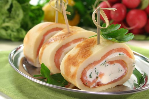 Pancakes filled with smoked salmon and cream cheese