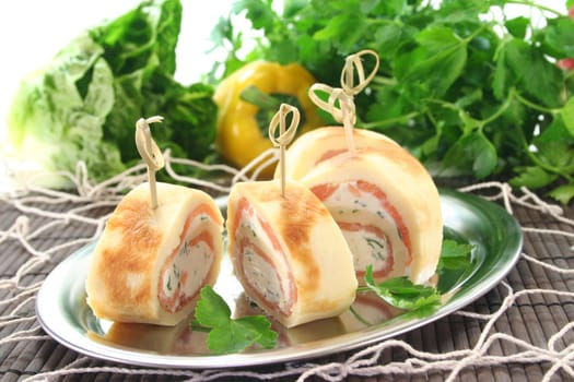 Pancakes filled with smoked salmon and cream cheese