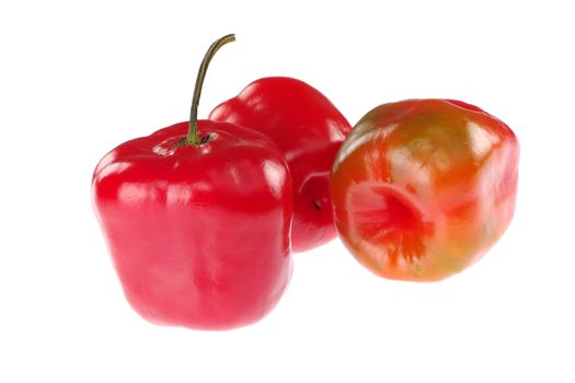 Rocoto (lat. Capsicum pubescens), hot chili pepper from South America isolated on white (Selective Focus, Focus on the front)