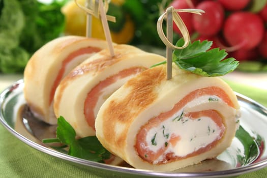 Pancakes filled with smoked salmon and cream cheese
