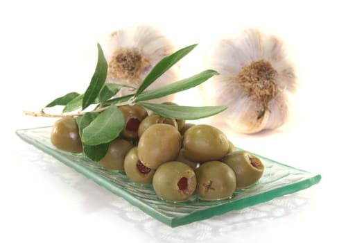 olives with olive branch and fresh garlic