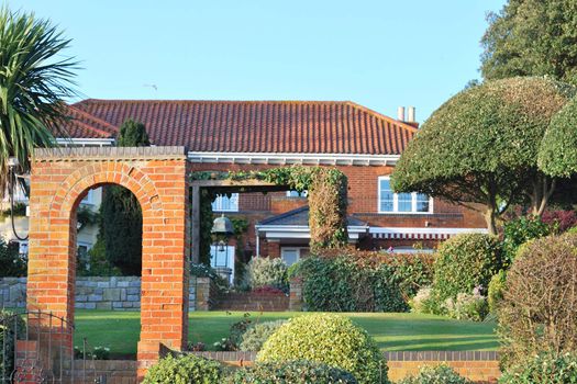 large house with immaculate garden