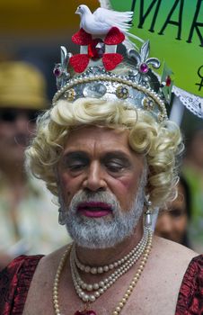 NEW YORK -  JUNE 26 : An unidentified participant celebrates gay pride parade after passing the same sex marrige bill in New York city on June 26 2011.