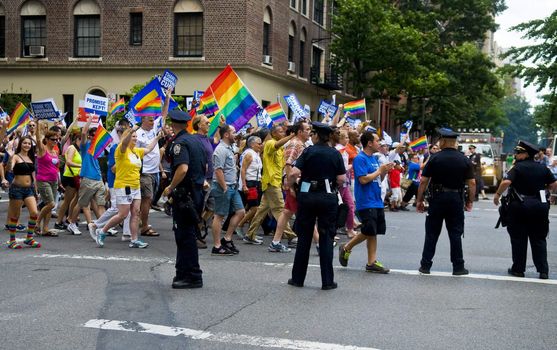 NEW YORK -  JUNE 26 : The gay pride parade after passing the same sex marrige bill in New York city on June 26 2011