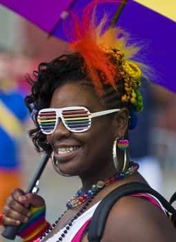 NEW YORK -  JUNE 26 : An unidentified participant celebrates gay pride parade after passing the same sex marrige bill in New York city on June 26 2011.