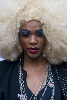 NEW YORK -  JUNE 26 : An unidentified participant celebrates gay pride parade after passing the same sex marrige bill in New York city on June 26 2011.