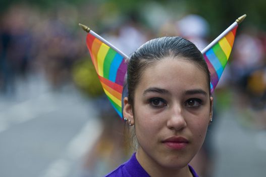 NEW YORK -  JUNE 26 : An unidentified participant celebrates gay pride parade after passing the same sex marrige bill in New York city on June 26 2011.