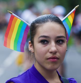 NEW YORK -  JUNE 26 : An unidentified participant celebrates gay pride parade after passing the same sex marrige bill in New York city on June 26 2011.