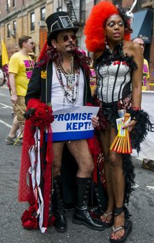 NEW YORK -  JUNE 26 : An unidentified participant celebrates gay pride parade after passing the same sex marrige bill in New York city on June 26 2011.