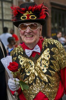 NEW YORK -  JUNE 26 : An unidentified participant celebrates gay pride parade after passing the same sex marrige bill in New York city on June 26 2011.