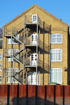 Riverside warehouse with fire escape