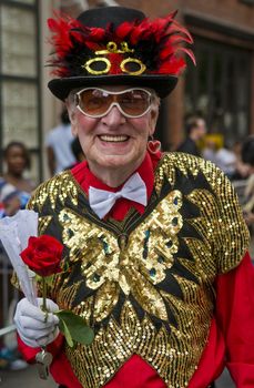 NEW YORK -  JUNE 26 : An unidentified participant celebrates gay pride parade after passing the same sex marrige bill in New York city on June 26 2011.