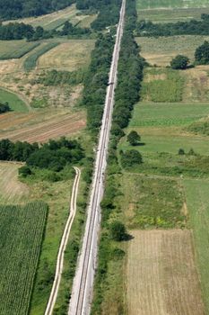 Railroad and green field