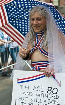 NEW YORK -  JUNE 26 : An unidentified participant celebrates gay pride parade after passing the same sex marrige bill in New York city on June 26 2011.