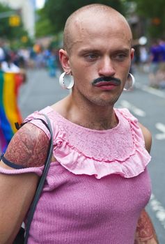 NEW YORK -  JUNE 26 : An unidentified participant celebrates gay pride parade after passing the same sex marrige bill in New York city on June 26 2011.