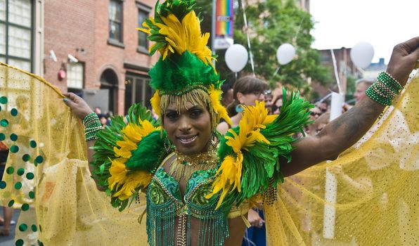 NEW YORK -  JUNE 26 : An unidentified participant celebrates gay pride parade after passing the same sex marrige bill in New York city on June 26 2011.